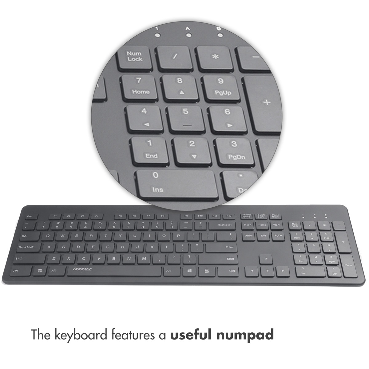 Czarna klawiatura z okrągłym zbliżeniem klawiatury numerycznej i napisem 'The keyboard features a useful numpad'.