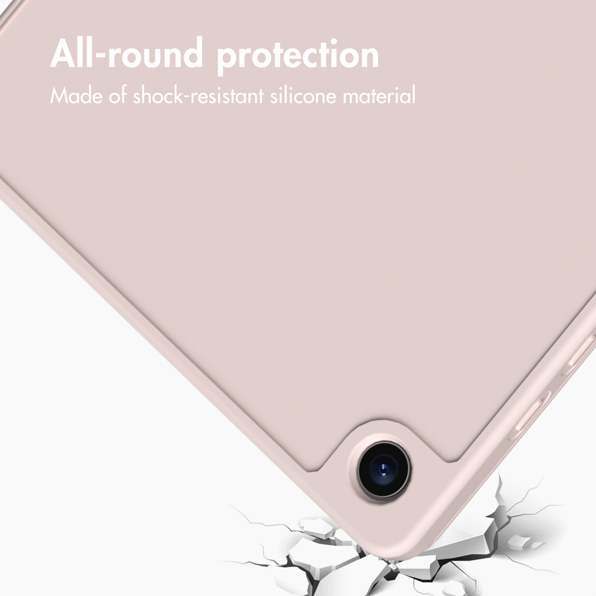 Pink silicone phone case protecting against impact on broken ground.