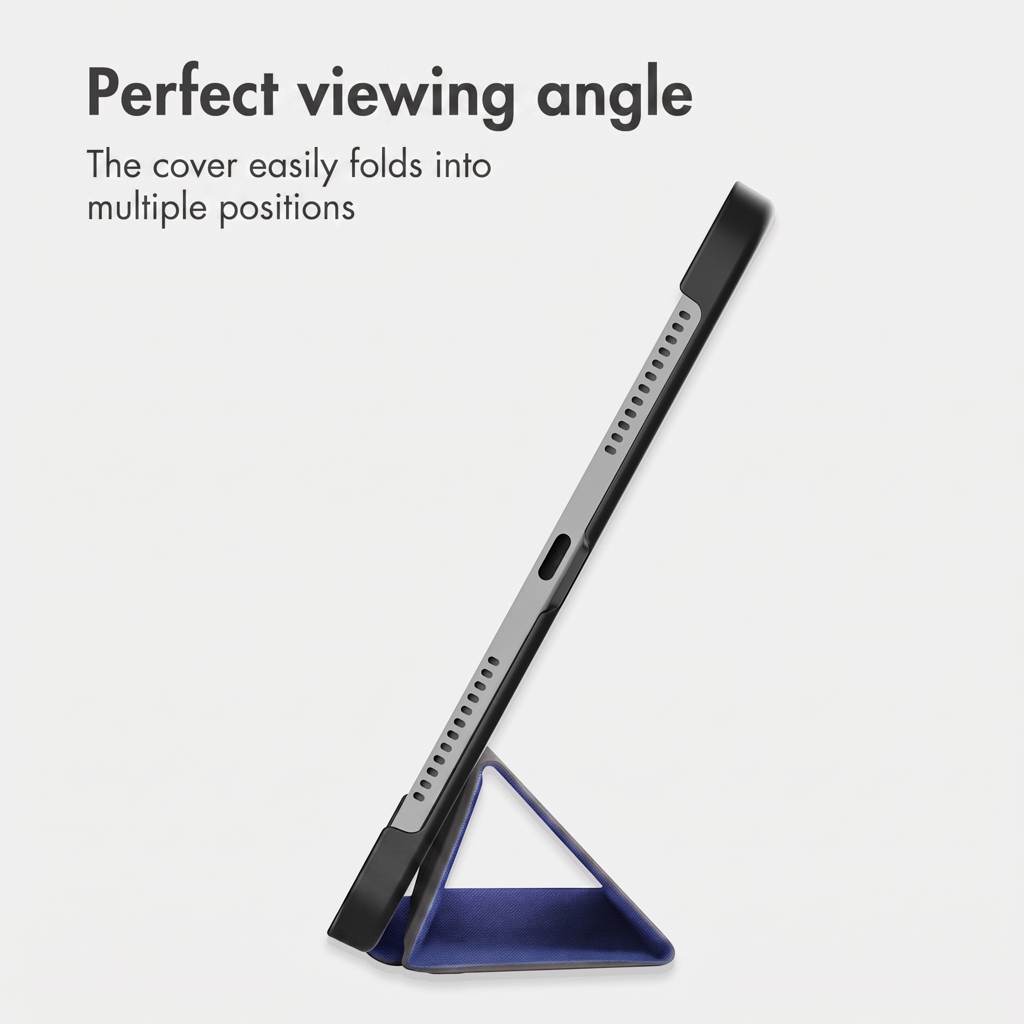 A tablet in a cover folded into a triangular stand rests on a light background.