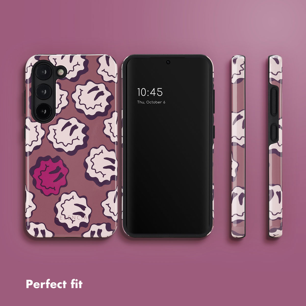 Un smartphone avec une coque violette à motif de visages souriants blancs et un rouge sur fond violet.