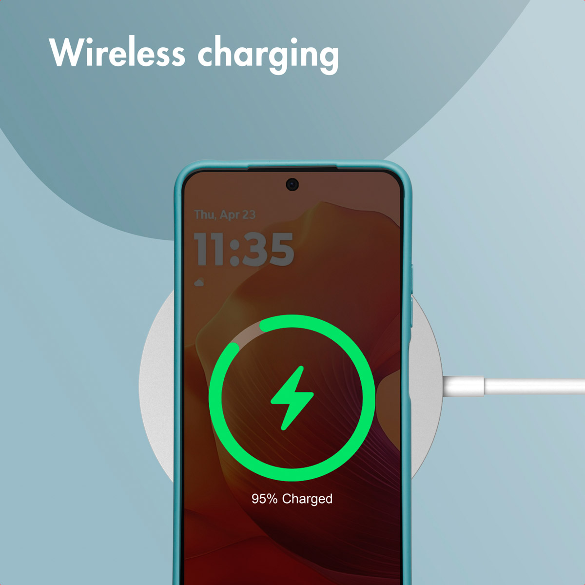 Un teléfono inteligente con texto 'Wireless charging' se carga en una base redonda.