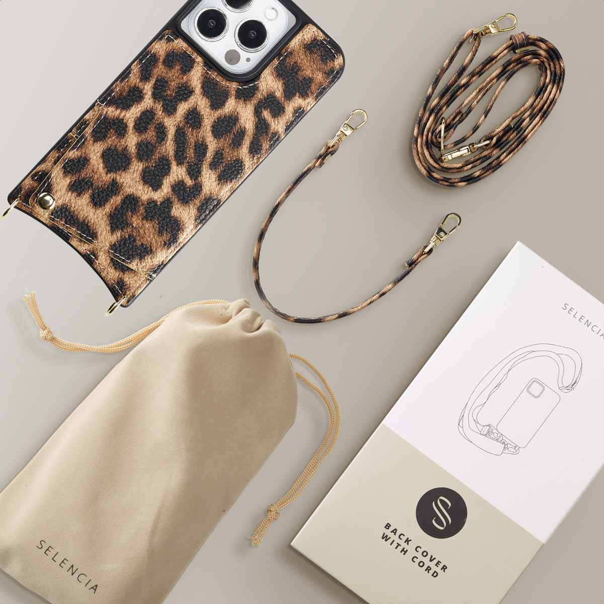 Funda de teléfono con estampado de leopardo, cordón, bolsa y caja.