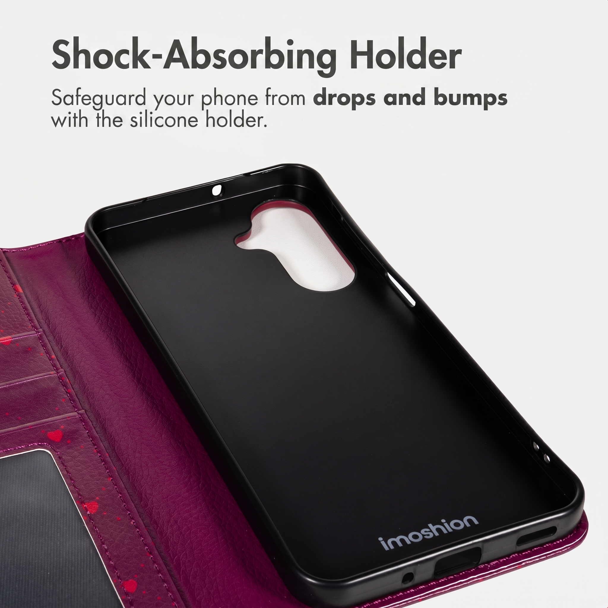 Una funda de móvil tipo libro magenta con soporte interior negro amortiguador y ranuras para tarjetas.