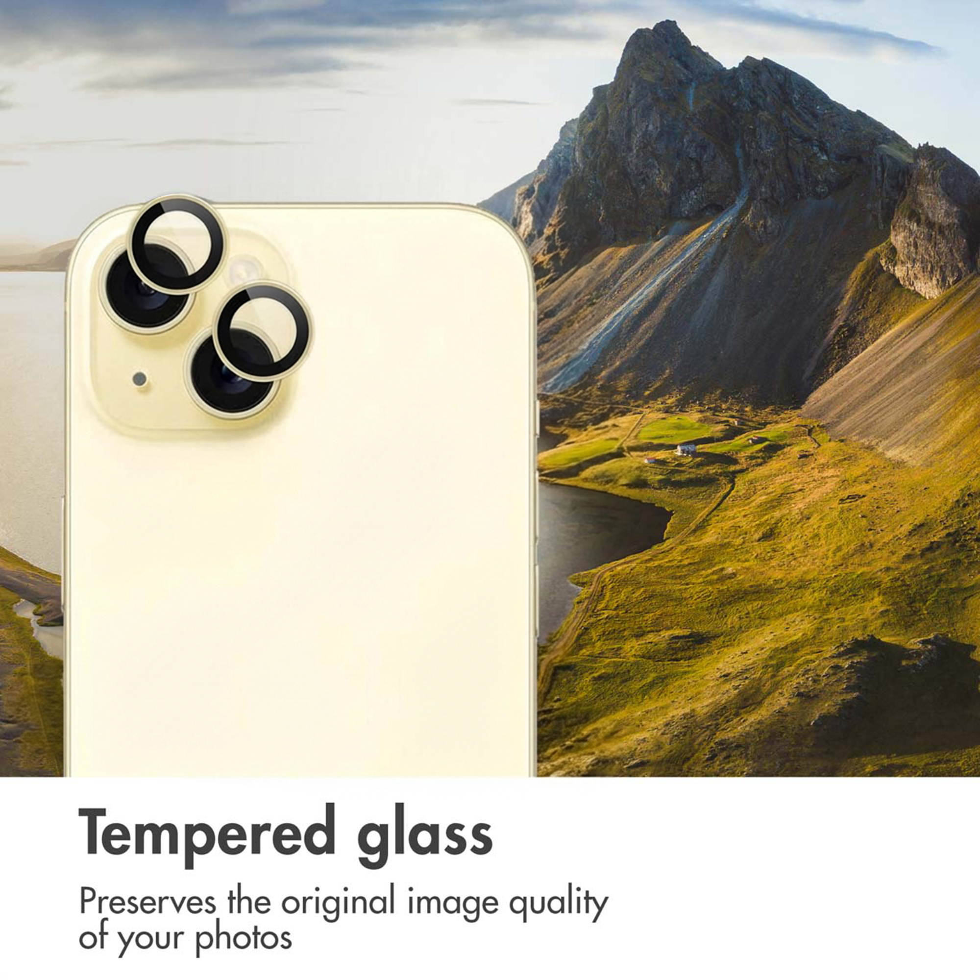 Een smartphone met cameralensbeschermers voor een berglyschap, met tekst over gehard glas eronder.
