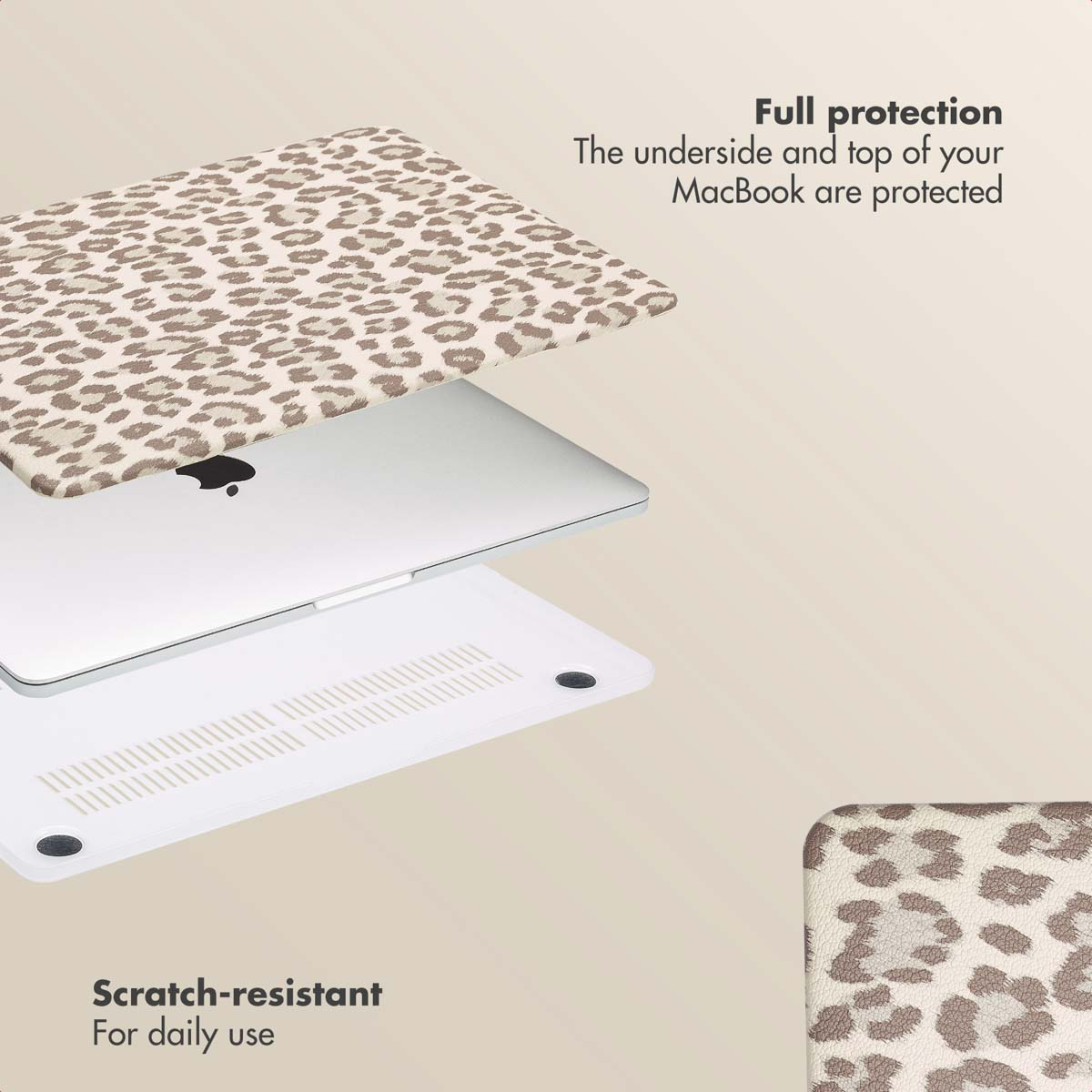 MacBook con carcasa superior de leopardo y funda inferior blanca.