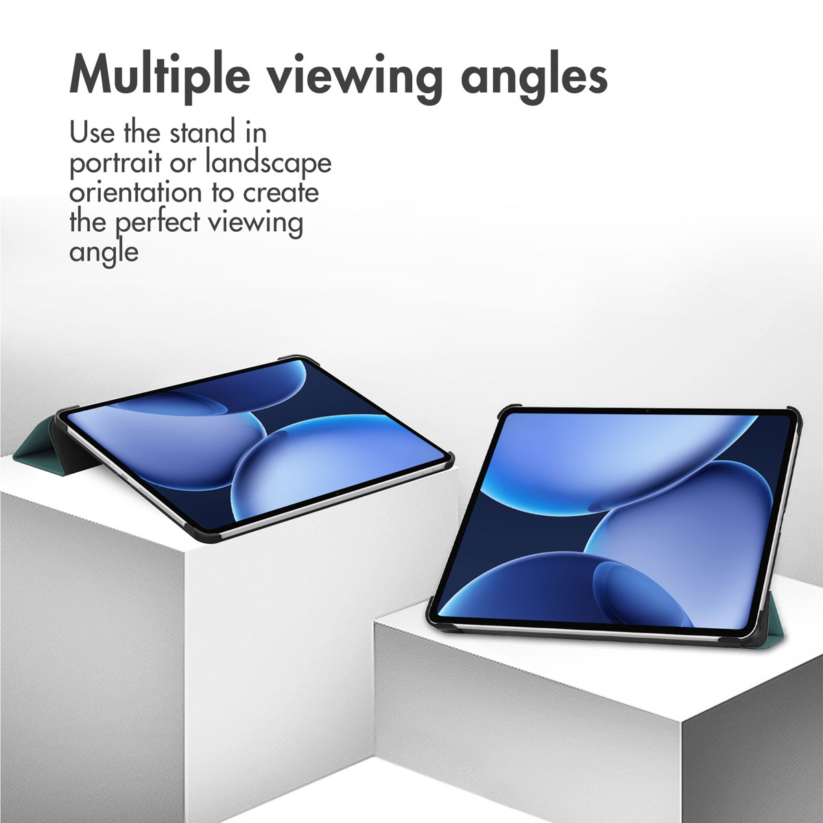 Two tablets in stands on white pedestals show different viewing angles.