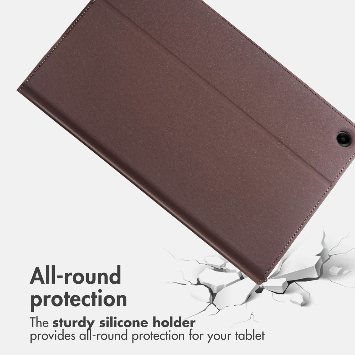 A brown tablet case above a cracked white floor with text promoting all-round protection.
