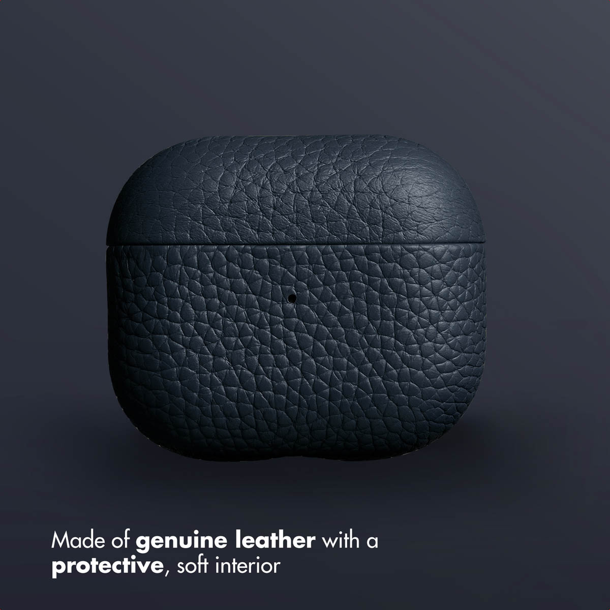 Un estuche de cuero gris oscuro para AirPods sobre fondo oscuro. Texto: de cuero genuino.