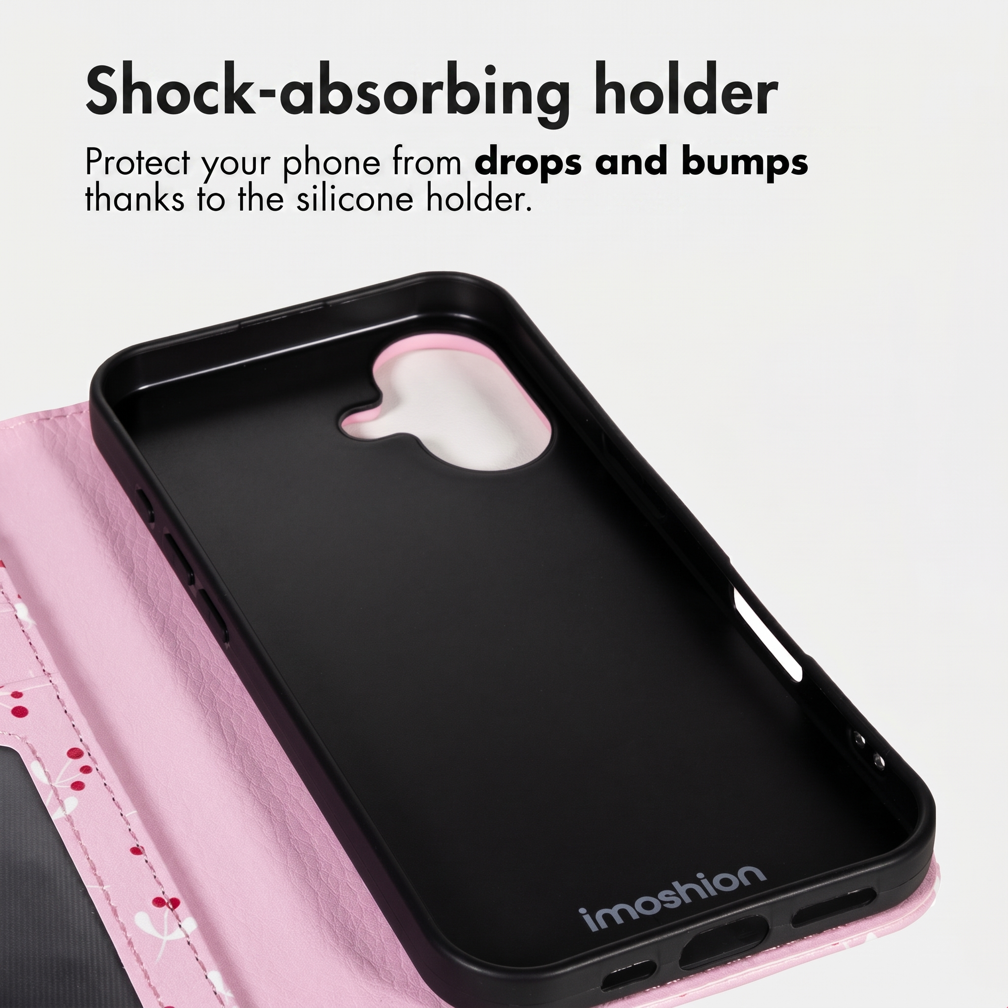 Schwarze Silikon-Handyhülle in einer rosa Schutzhülle mit Text.