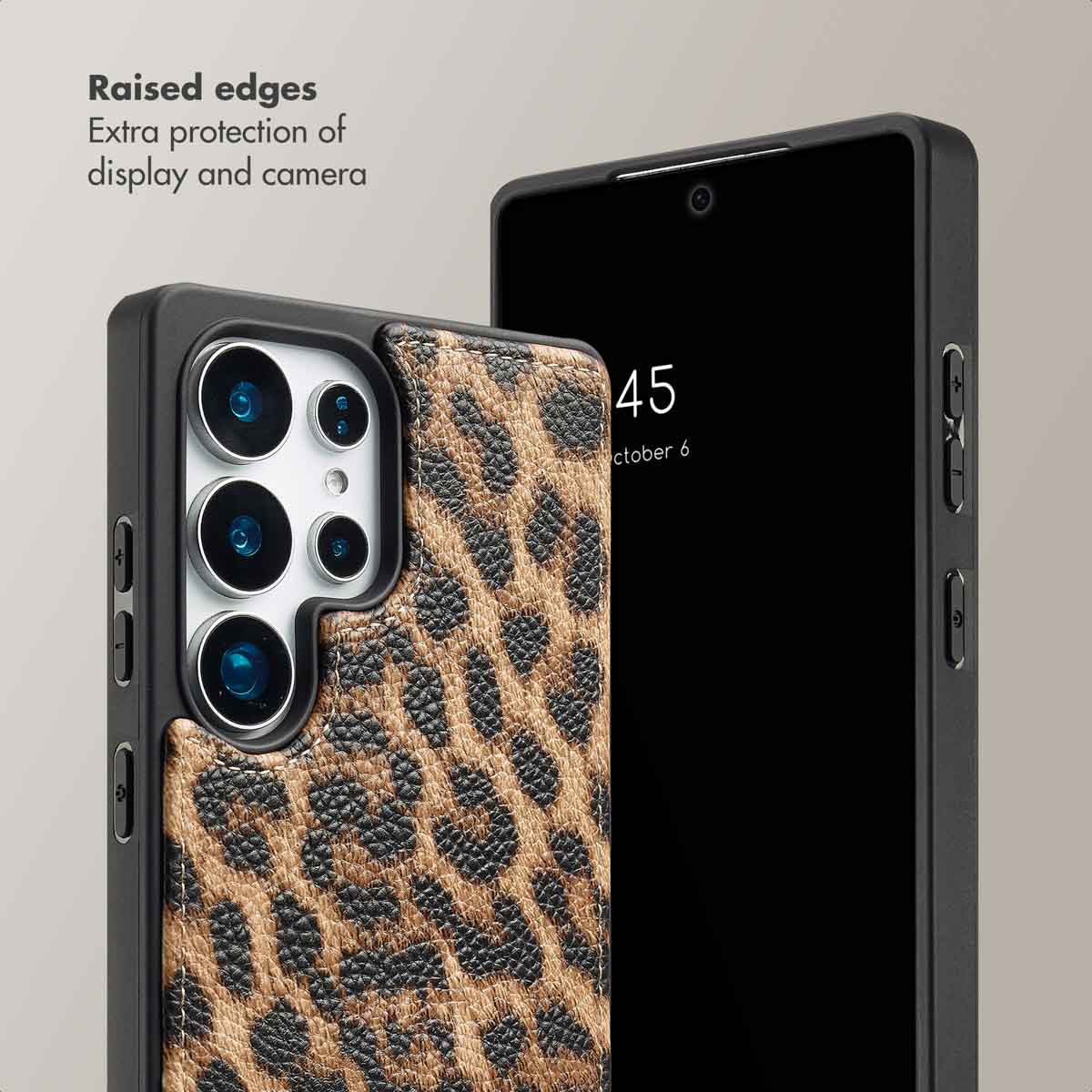 A smartphone in a black case with a leopard print back, showing raised edges for screen and camera protection.