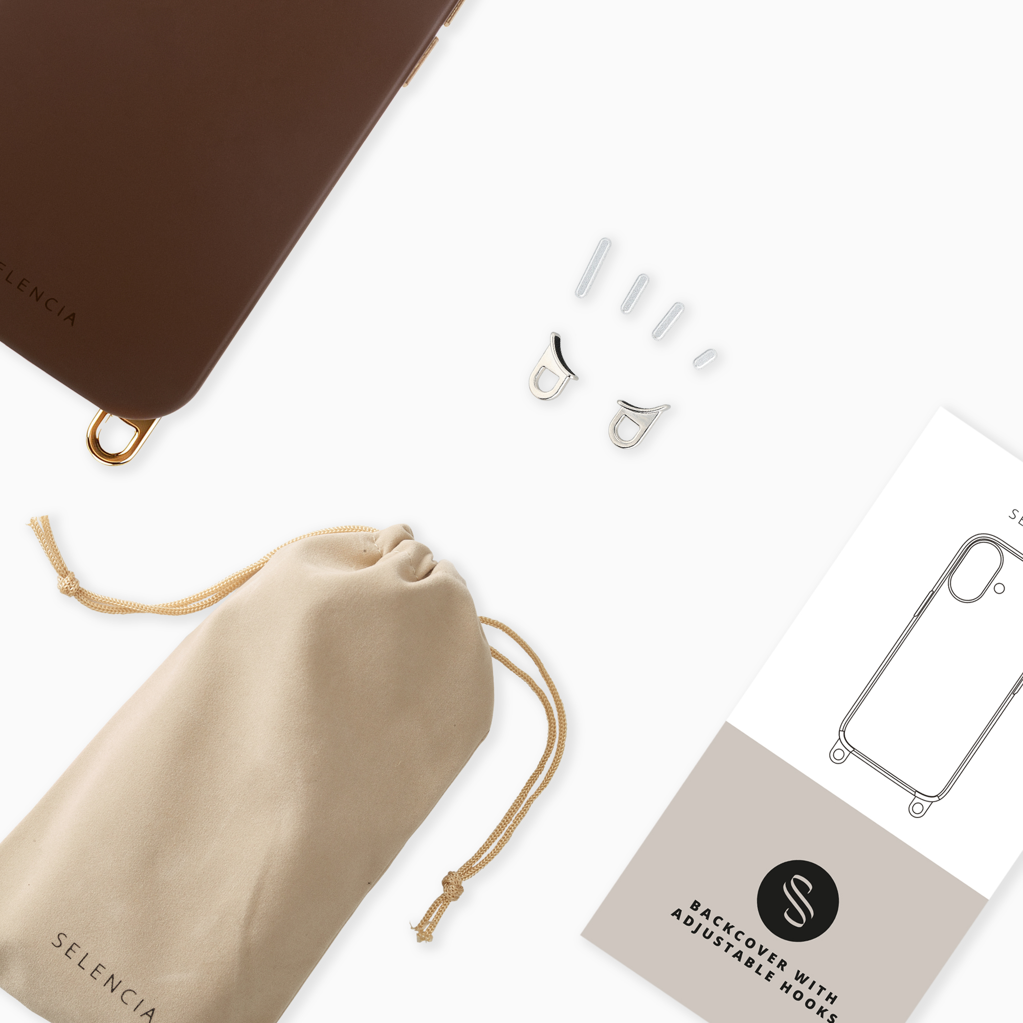 Fundas de teléfono marrones, bolsa beige, pequeños accesorios plateados e instrucciones de producto sobre fondo blanco.