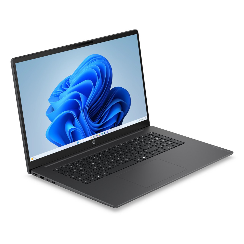 Szary laptop na białym tle wyświetla ekran z abstrakcyjnym niebieskim wzorem.
