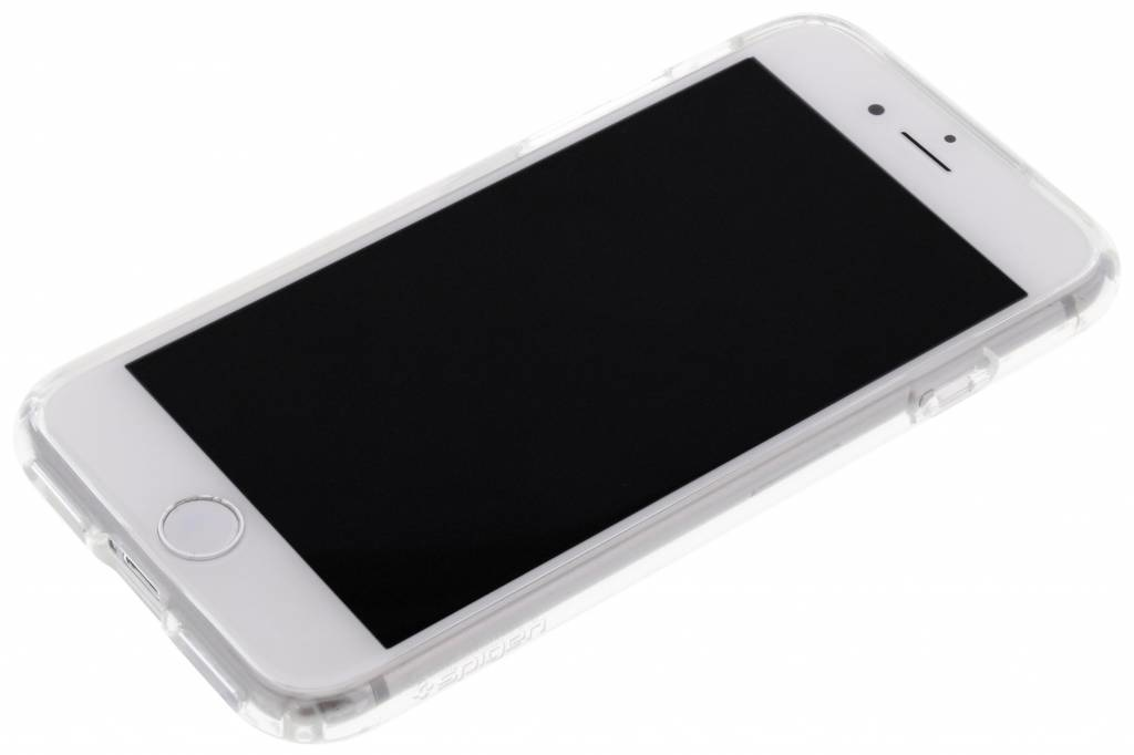 Biały smartfon w przezroczystym etui leży ukośnie na białym tle.