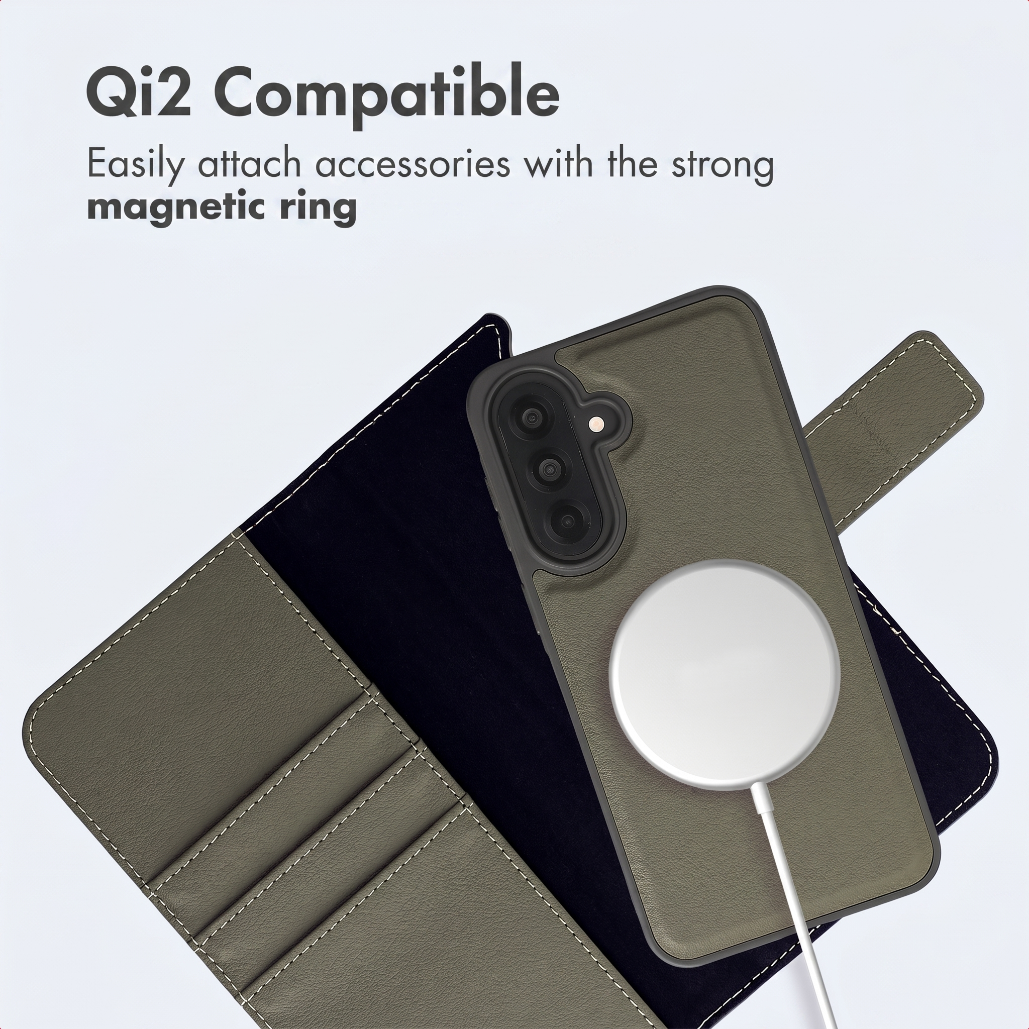 Un smartphone gris en una funda tipo cartera con cable de carga magnético y texto arriba.