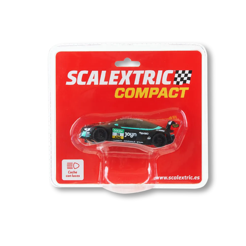 Un coche de carreras de juguete Scalextric Compact en su embalaje rojo original con texto blanco y amarillo.