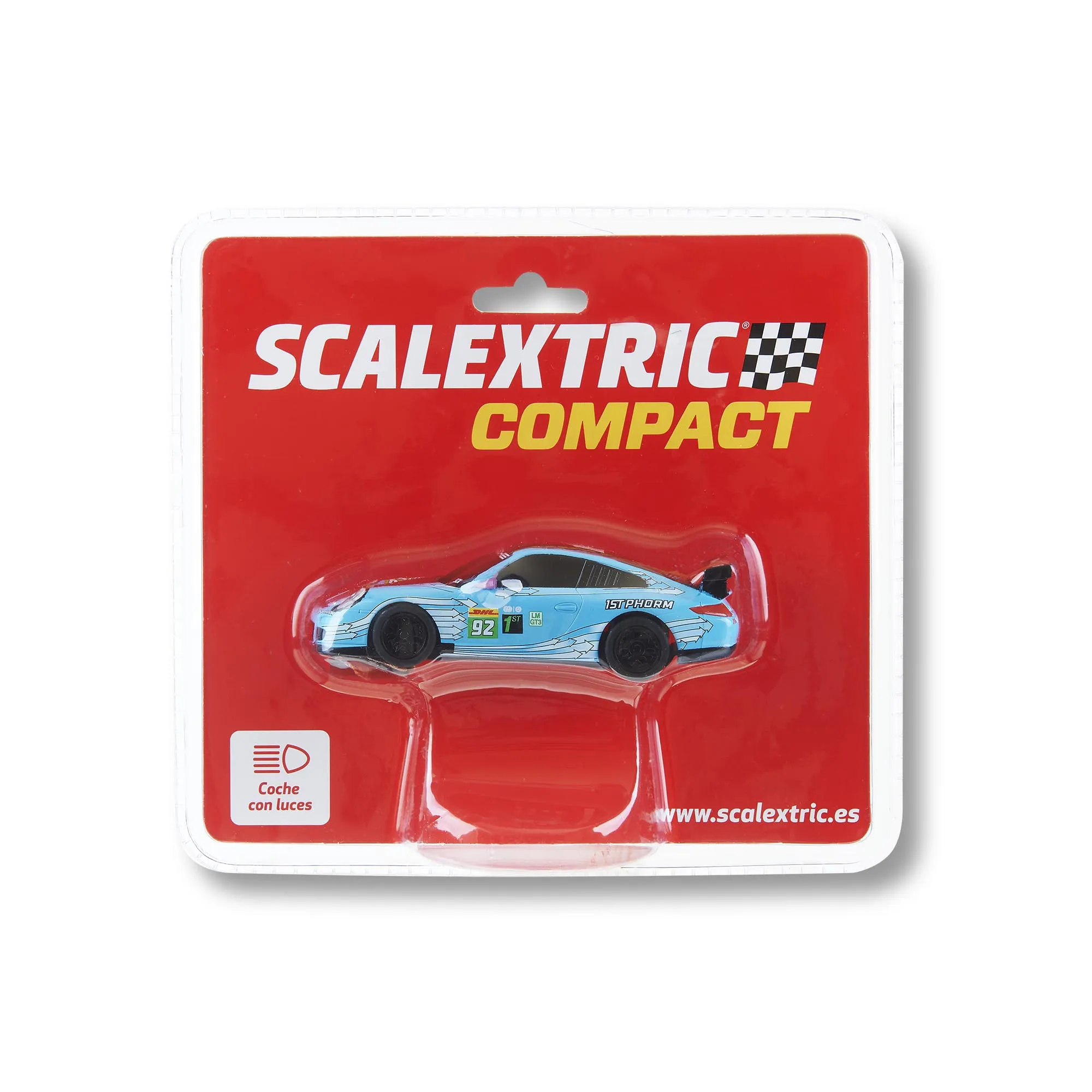 Un coche de juguete Scalextric Compact en su embalaje original, con un modelo de coche de carreras azul claro.
