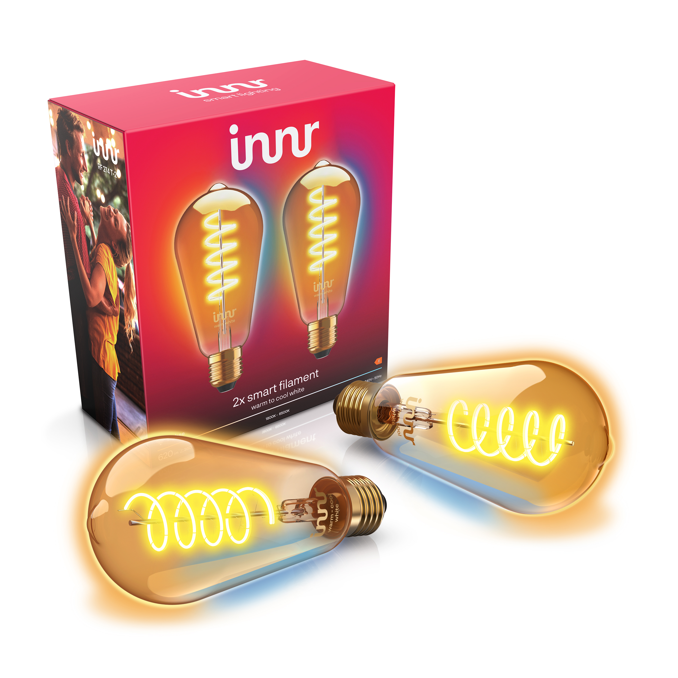 Deux ampoules connectées à filament style Edison lumineuses devant une boîte rouge.