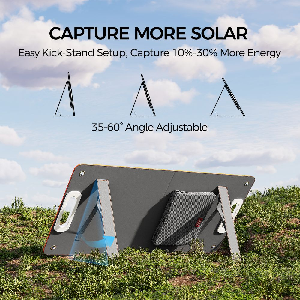 Panel solar portátil con soportes ajustables en una colina cubierta de hierba bajo un cielo azul.