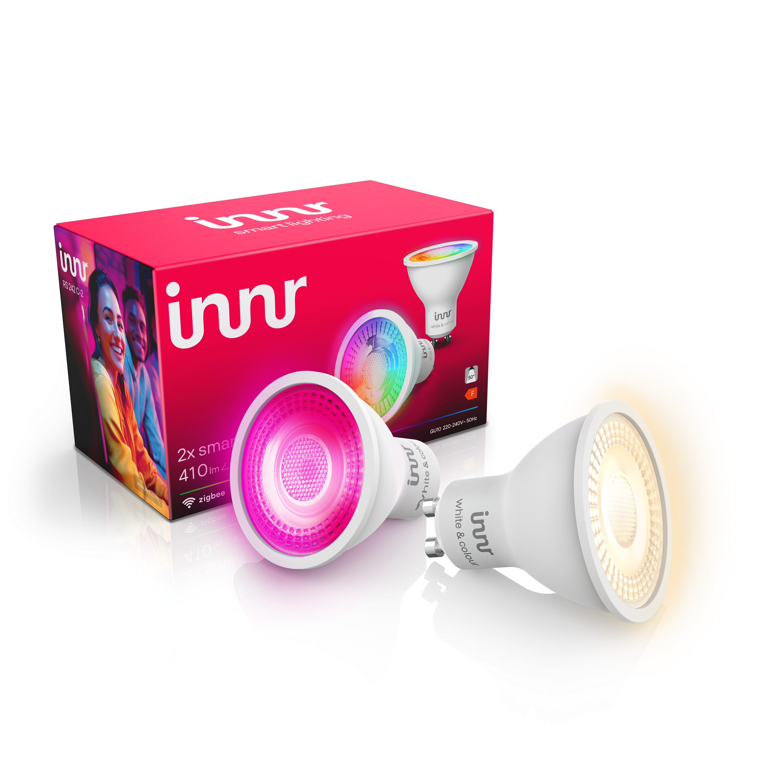 Deux ampoules LED connectées Innr devant leur boîte rose sur fond noir ; l'une brille en rose, l'autre en blanc chaud.