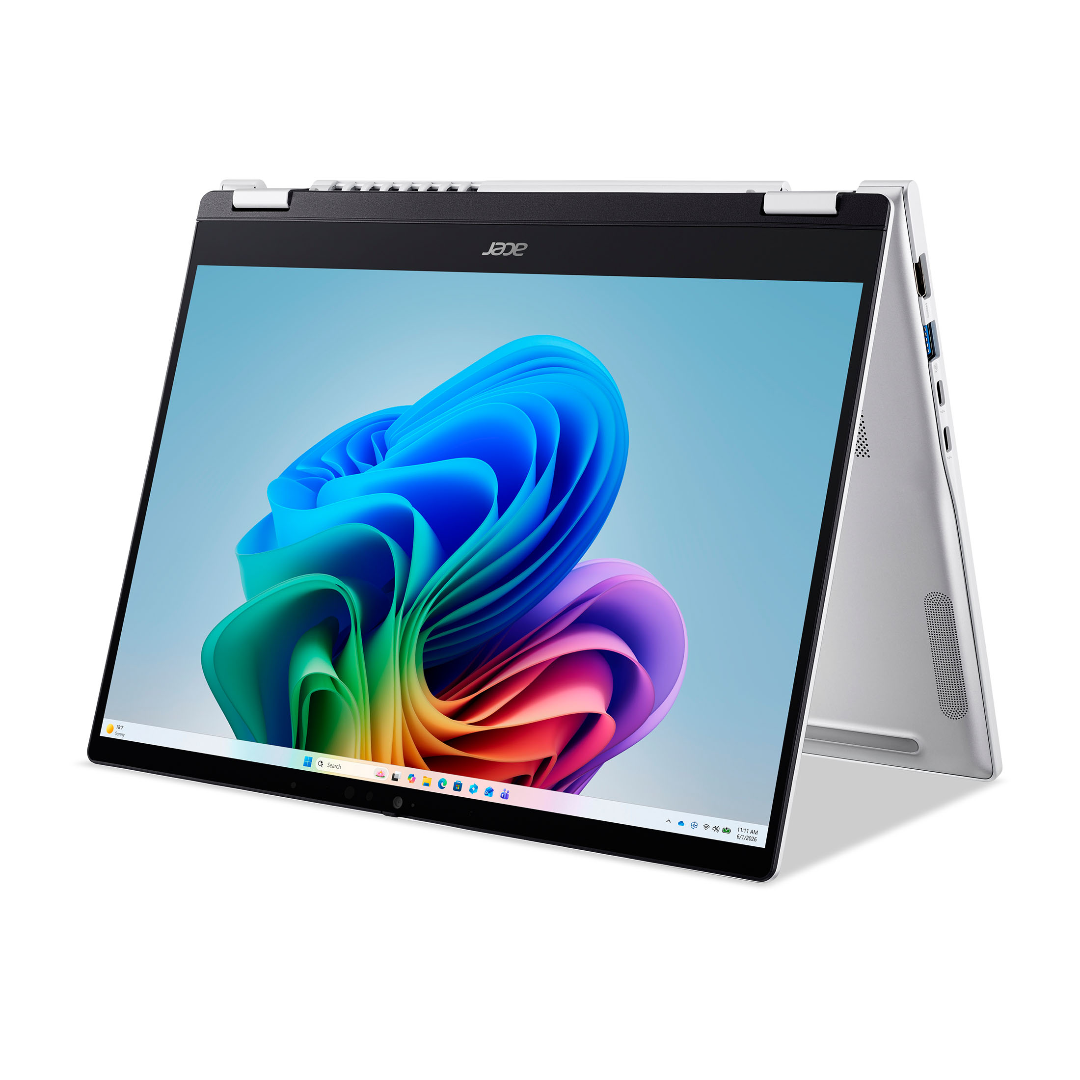 Ein offener, silberner Acer-Convertible-Laptop im Zeltmodus zeigt ein farbenfrohes, abstraktes Windows-11-Hintergrundbild.