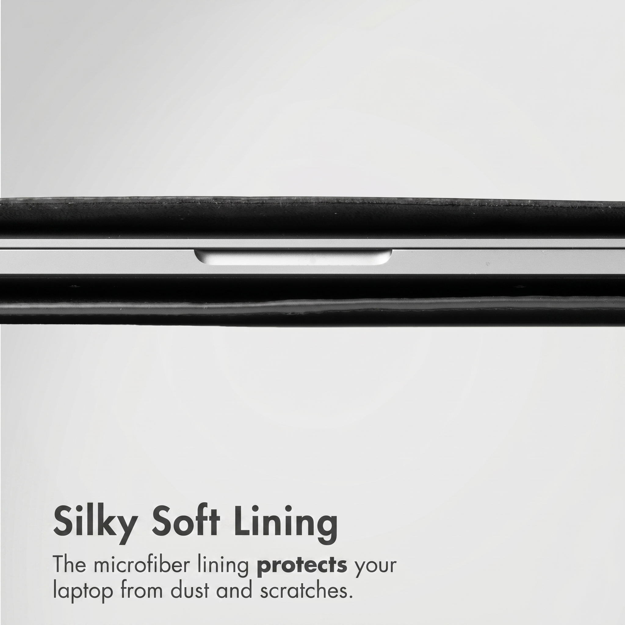 Vista lateral de un portátil cerrado en una funda protectora oscura con texto sobre el forro de microfibra.