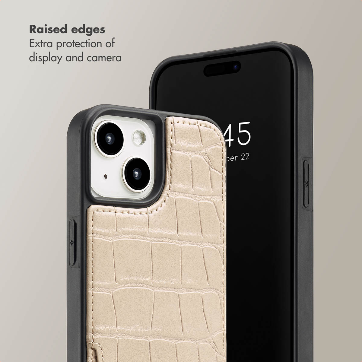 Twee zwarte smartphones met beige krokodillenlederen hoesjes en opstaande randen.
