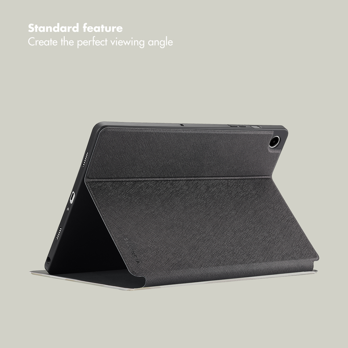 A black tablet in a textured protective case acting as a stand against a gray background.
