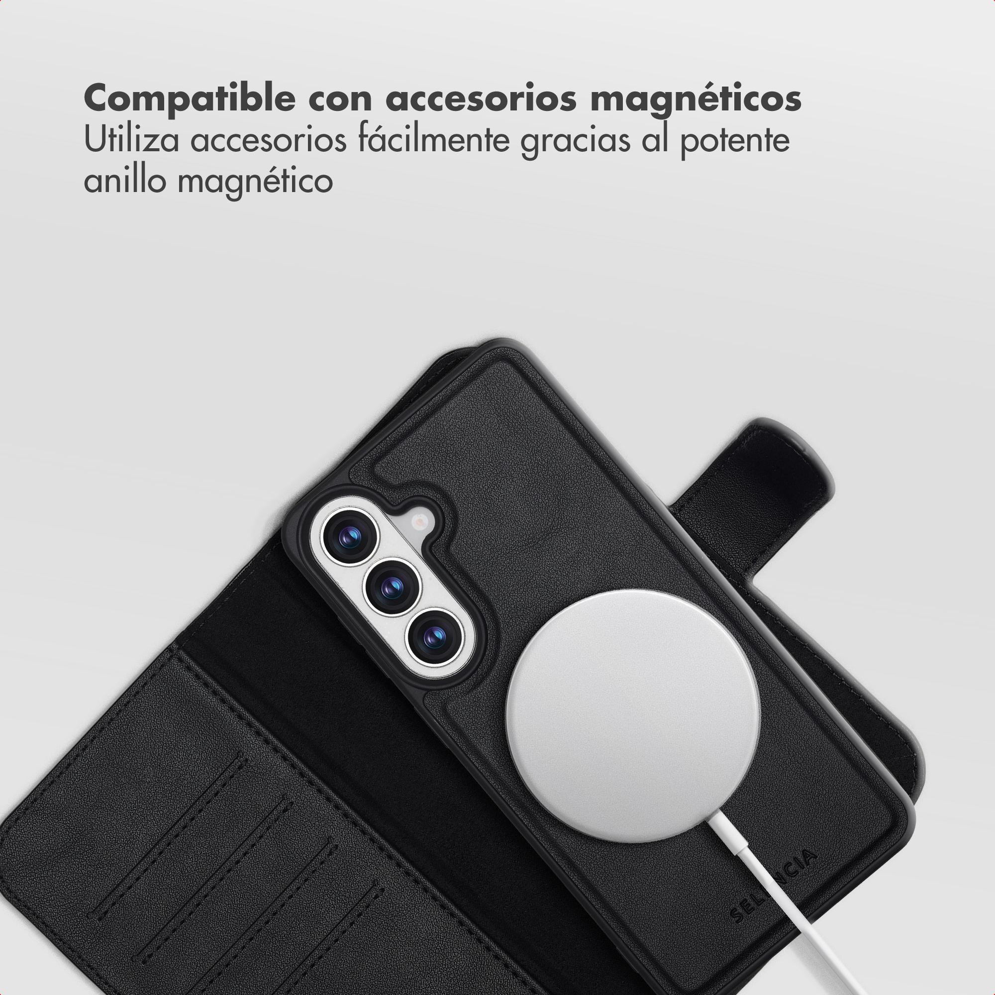 Funda negra para teléfono tipo libro con un cargador circular blanco MagSafe adherido.