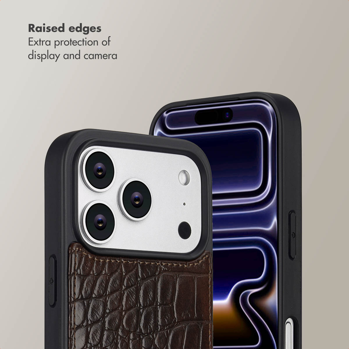 Dos teléfonos inteligentes en fundas protectoras con texto sobre bordes elevados para mayor protección.