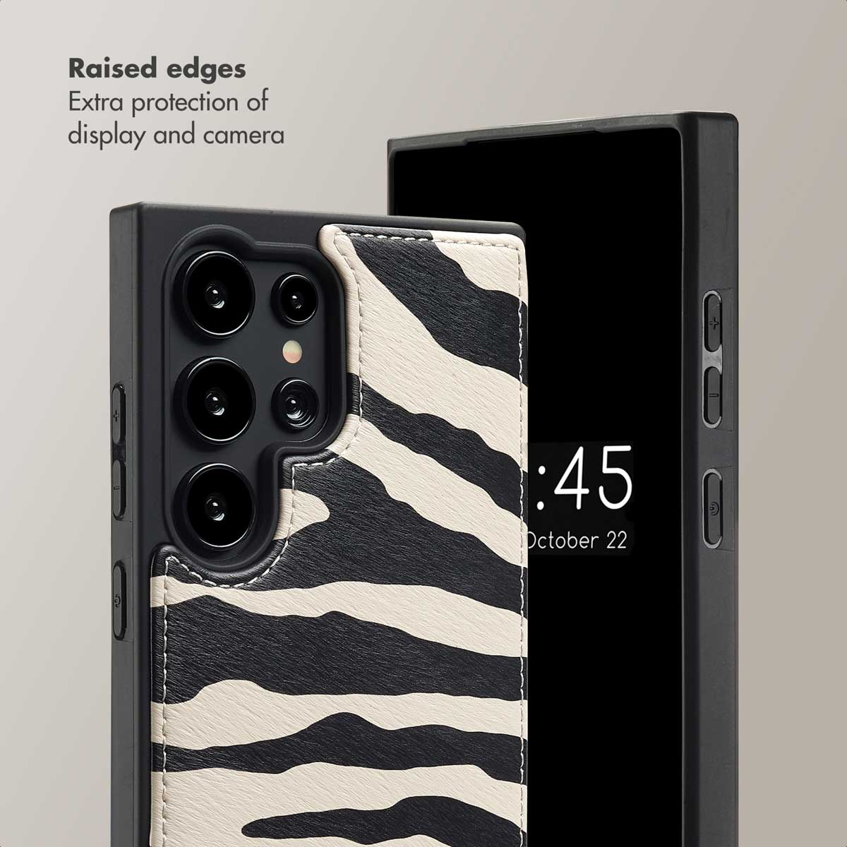 Smartphone con patrón de cebra blanco y negro, con bordes elevados para protección de pantalla y cámara.