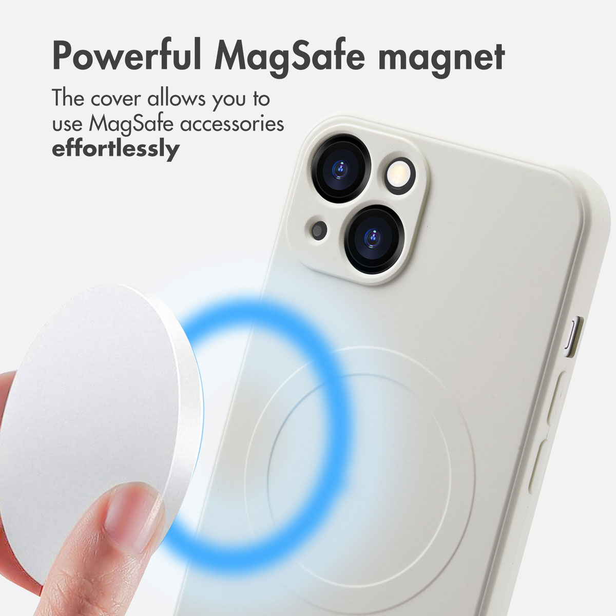 Une coque de téléphone MagSafe blanche et un aimant rond tenu en main.