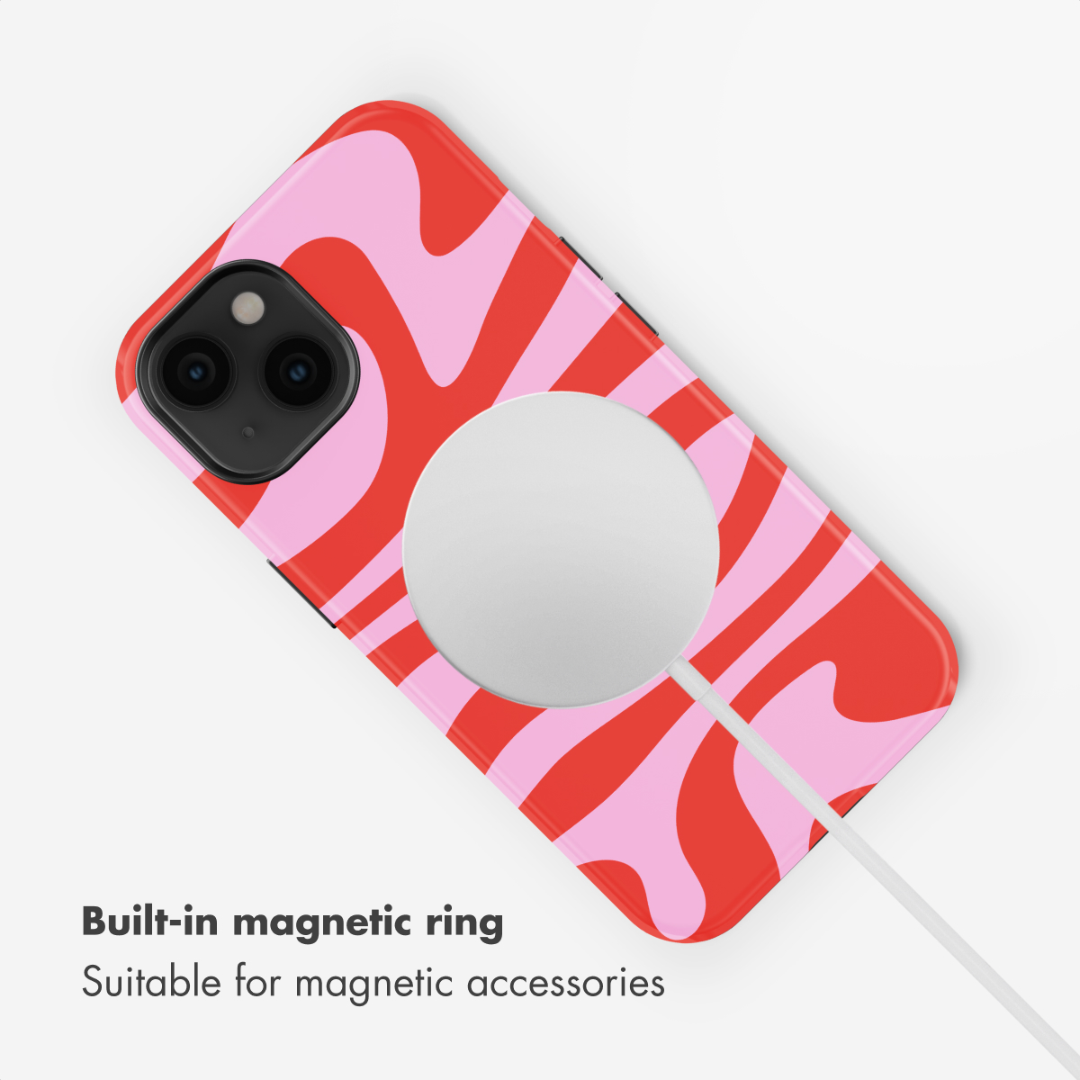 Una funda de móvil con ondas rojas y rosas y un disco magnético en la parte posterior.