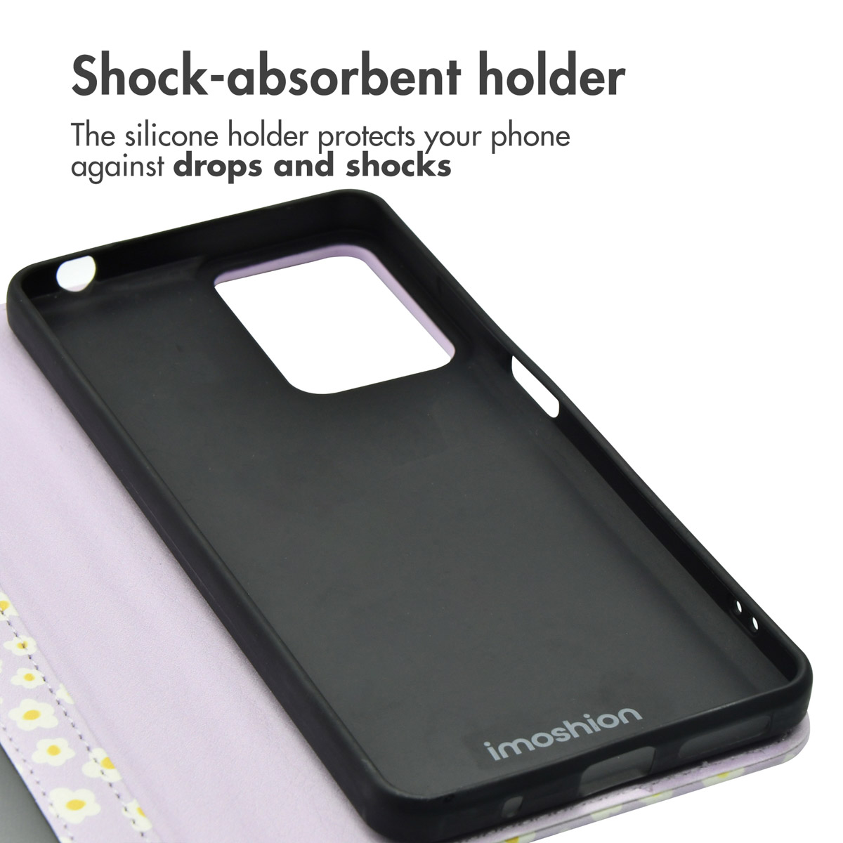 Una funda de silicona negra amortiguadora con diseño floral dentro y texto arriba.