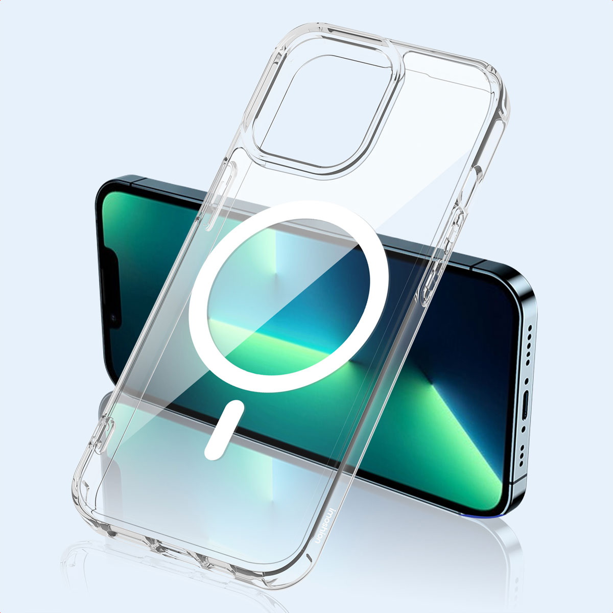 Una custodia MagSafe trasparente davanti a uno smartphone su sfondo azzurro.