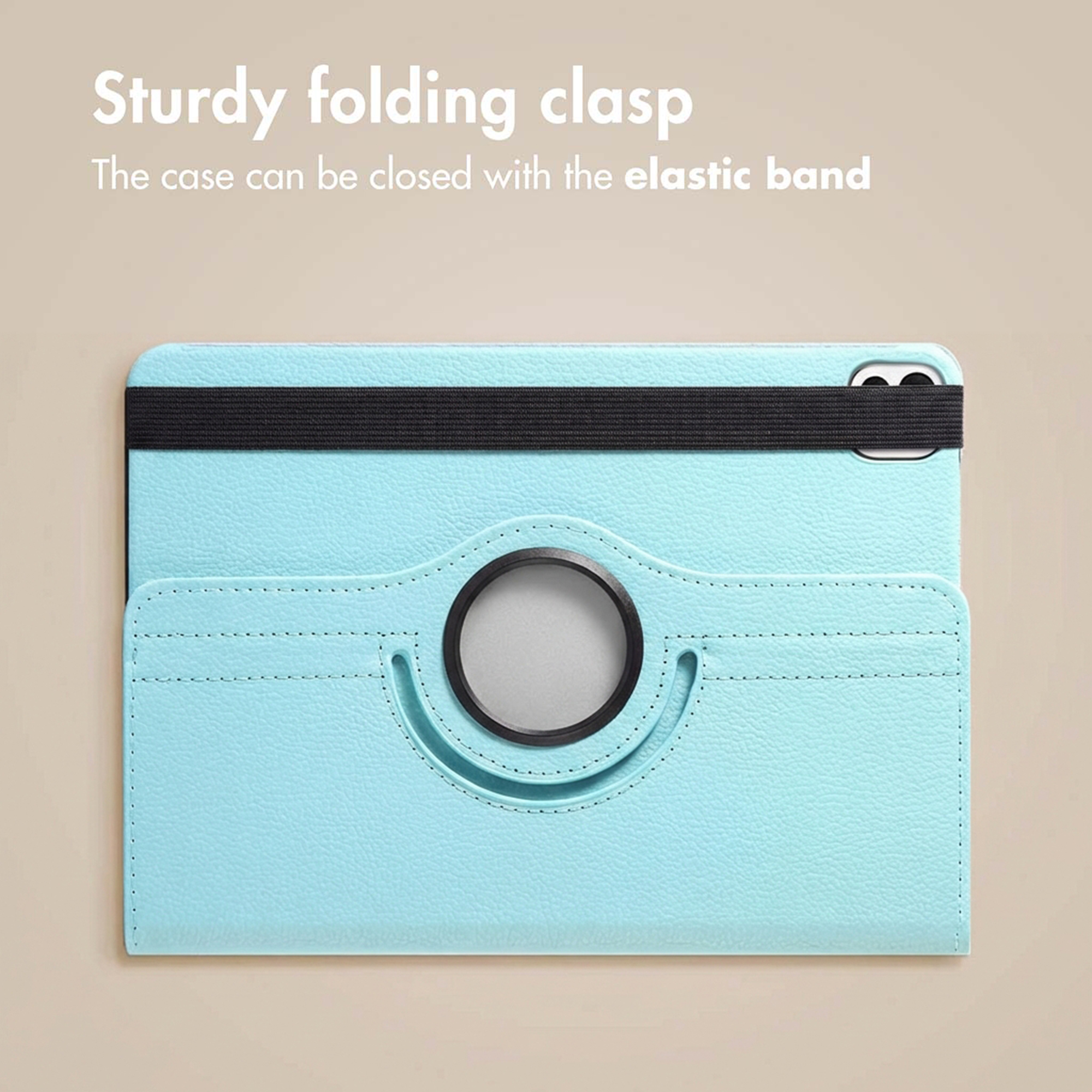 A light blue tablet case with a black elastic band and a circular ring stand on a beige background.