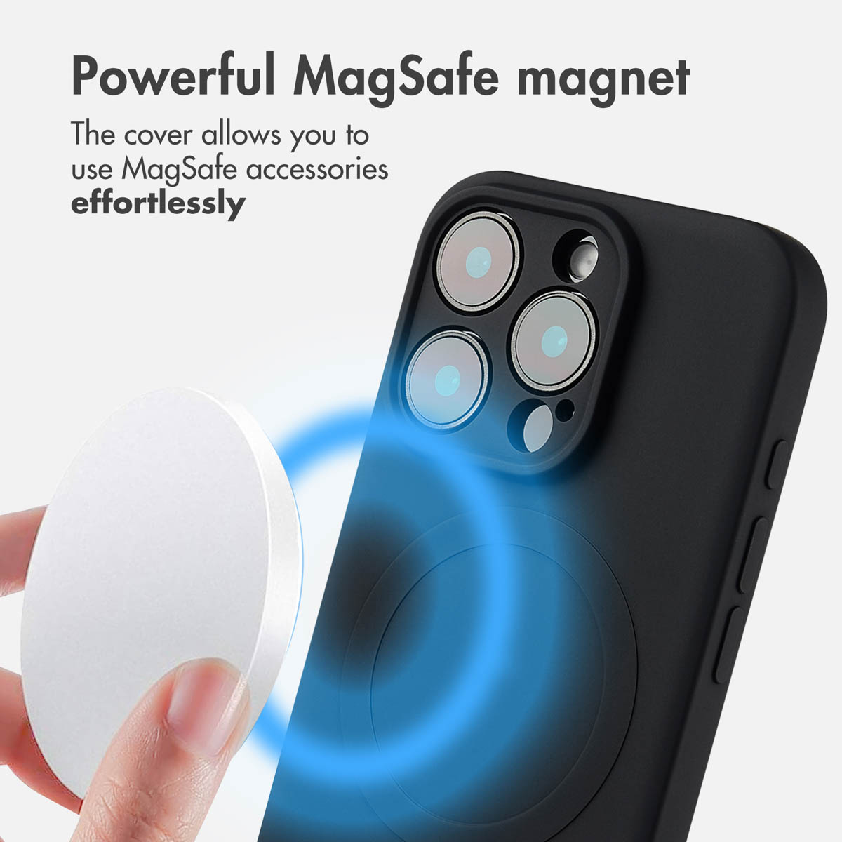 Téléphone avec coque de protection noire et aimant MagSafe blanc.