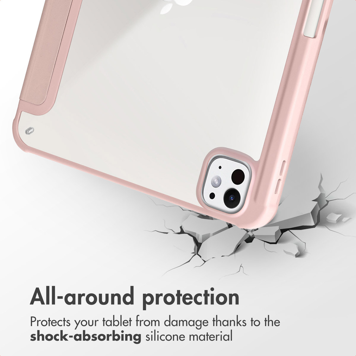 Coque de tablette rose sur surface fissurée avec texte d'absorption des chocs.