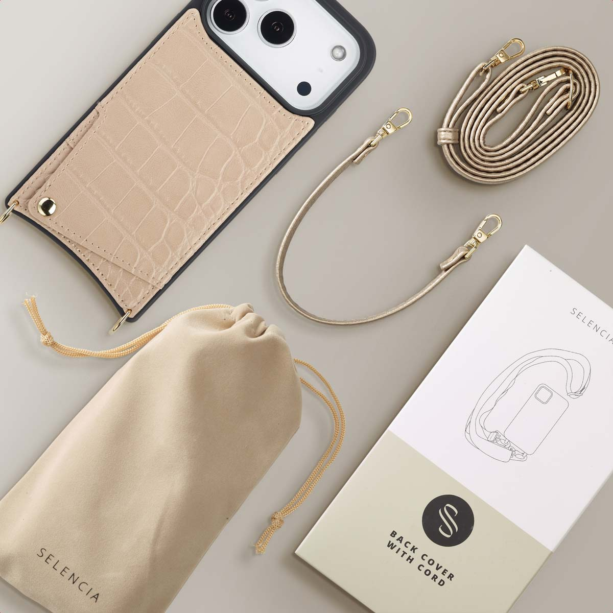 Funda de móvil de cocodrilo beige, correas corta y larga, bolsa y caja.