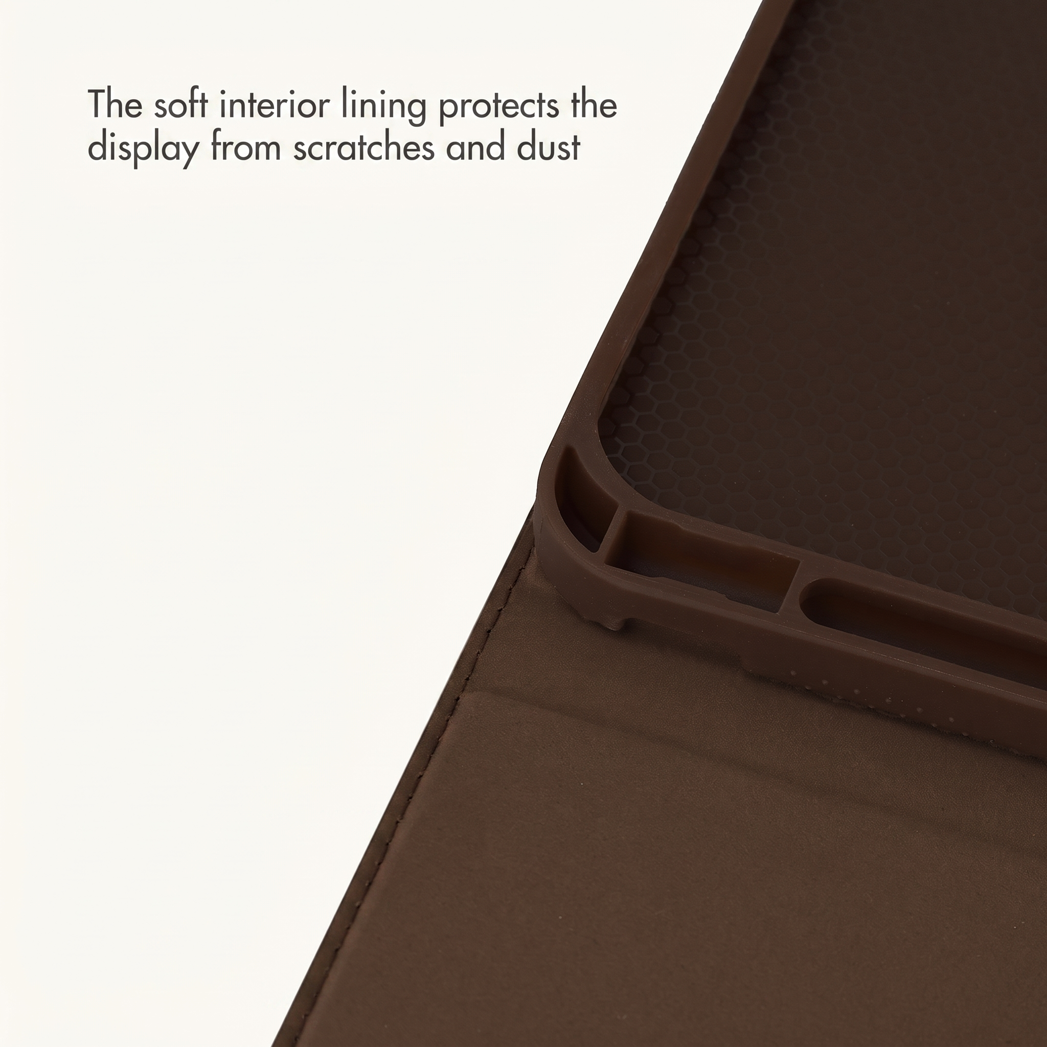 Close-up of a brown phone case interior with text on the white background.