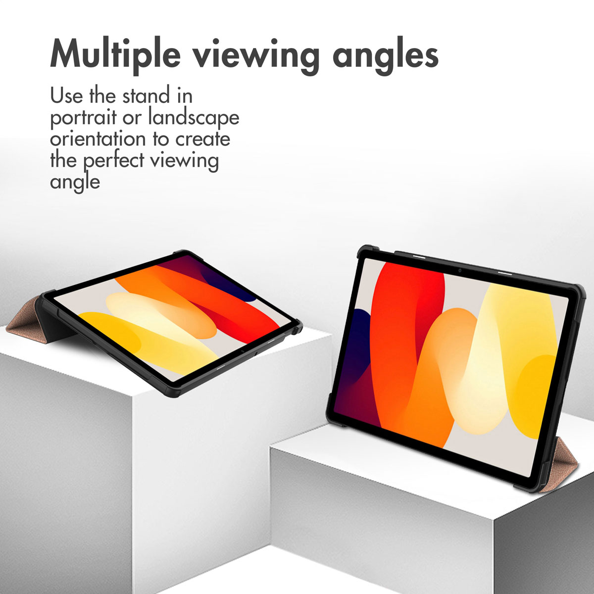 Two tablets with colorful screens stand on white pedestals, demonstrating multiple viewing angles and stands.