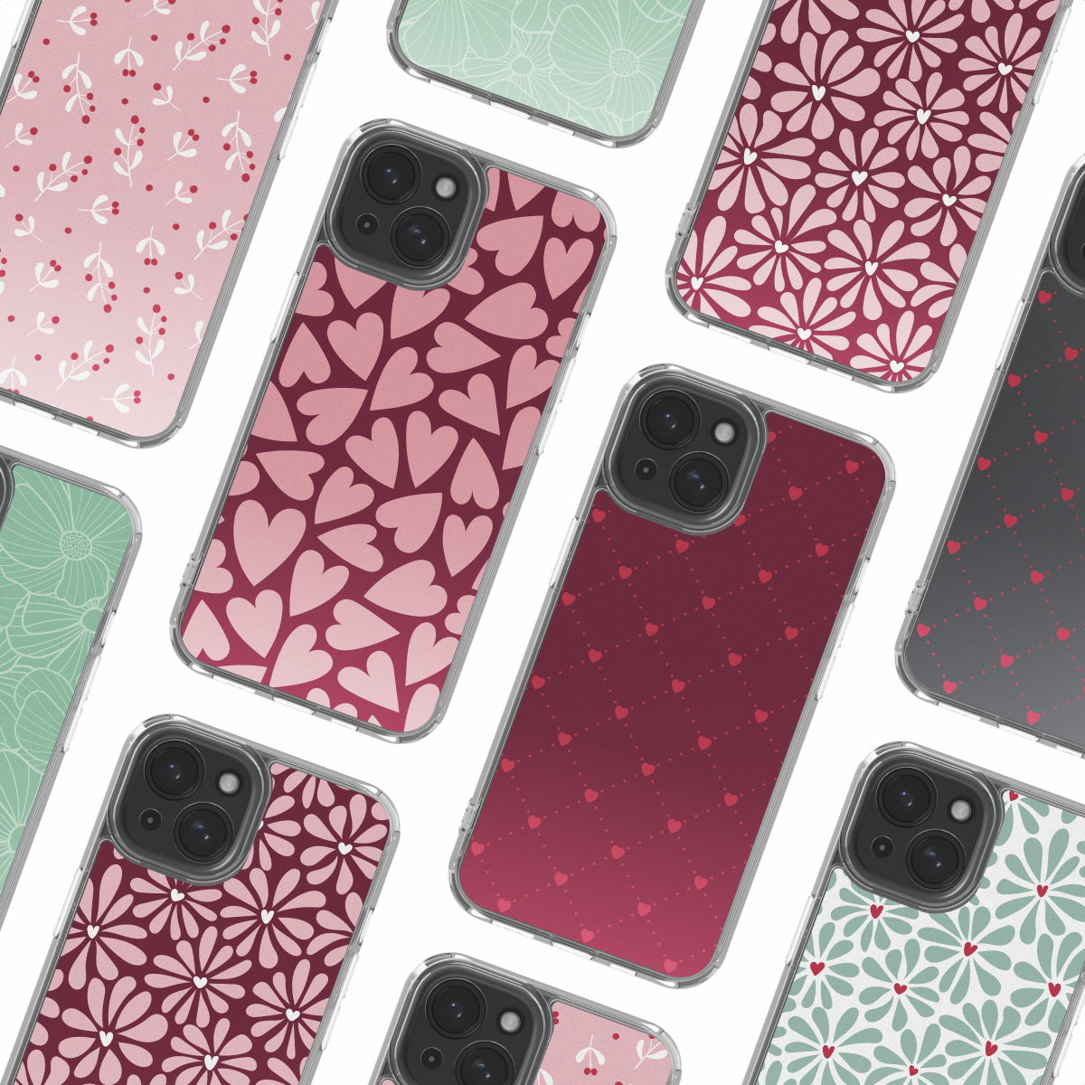 Verschillende smartphones met verschillende kleurrijke hoesjes liggen op een wit oppervlak.