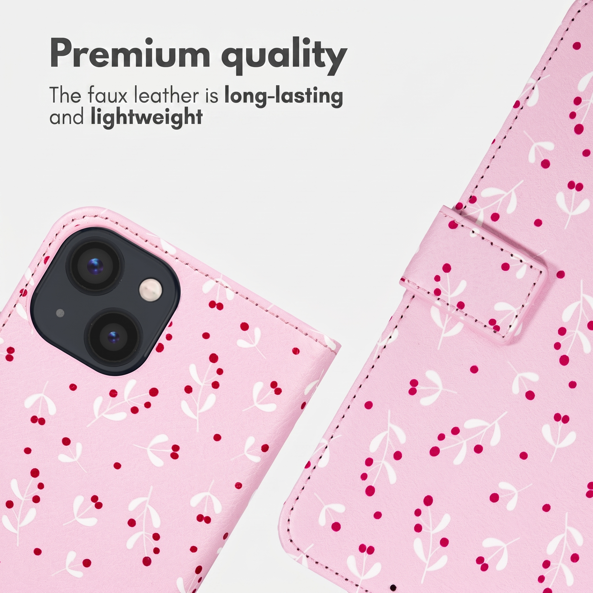 Roze kunstlederen telefoonhoesje met wit planten- en rode bessenpatroon. Tekst boven.