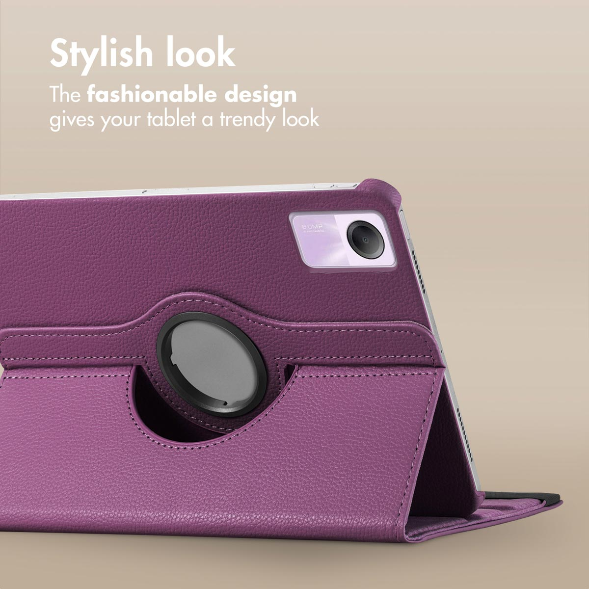 A tablet in a purple leather stand case with a rotating circular grip on the back against a plain background.