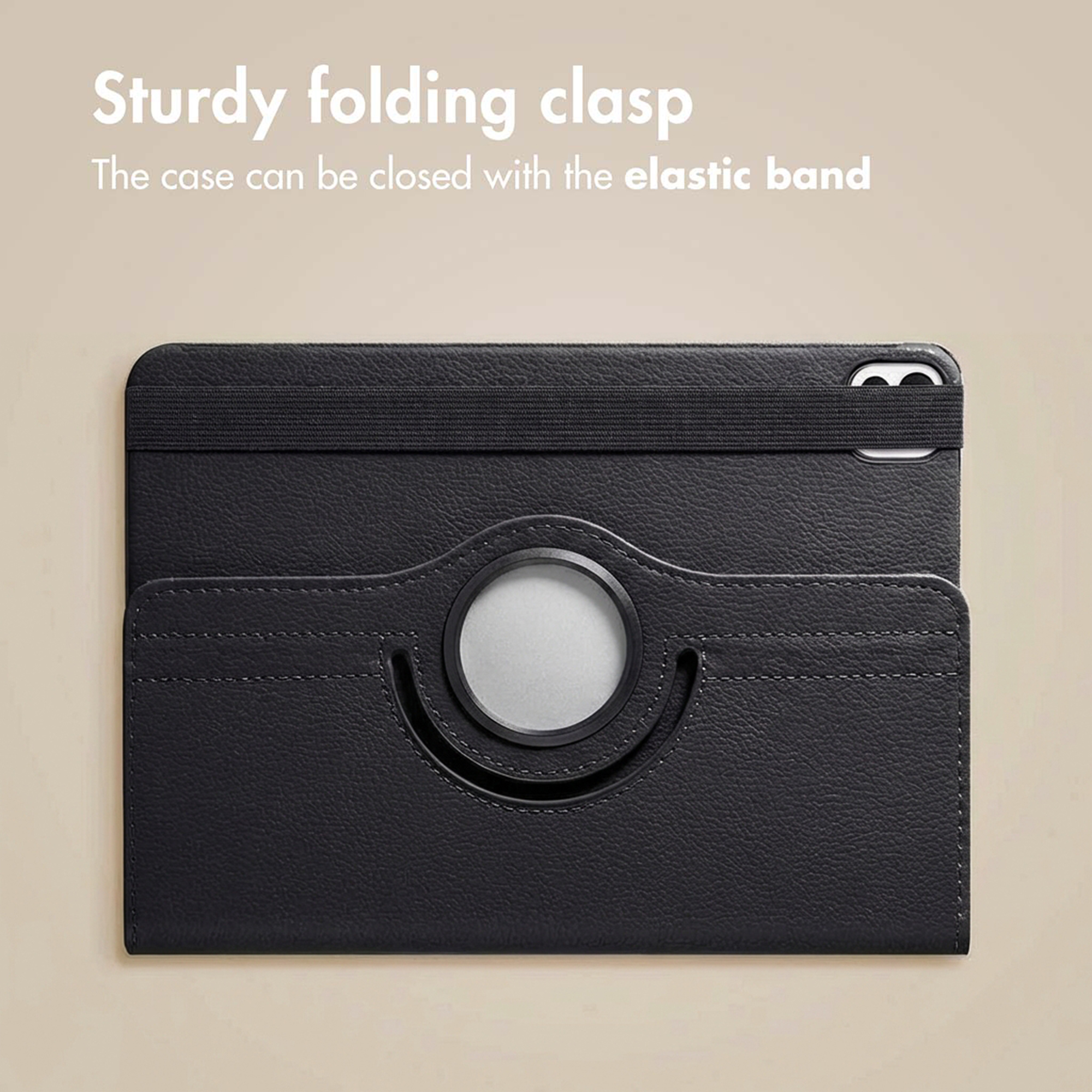 Black tablet case with elastic band and round stand against a light background.