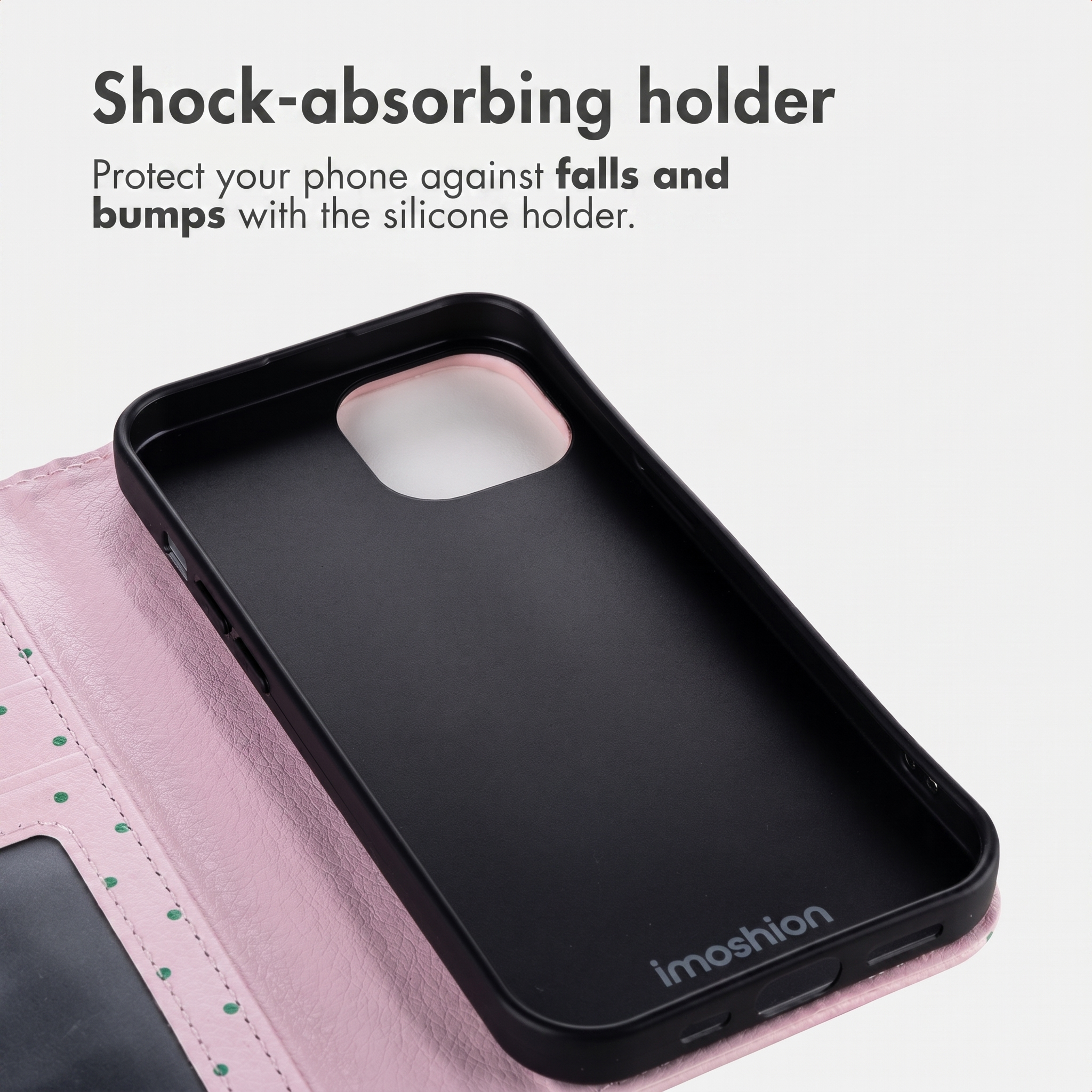 Roze kunstlederen telefoonhoesje met zwarte siliconen houder en tekst over schokabsorptie.
