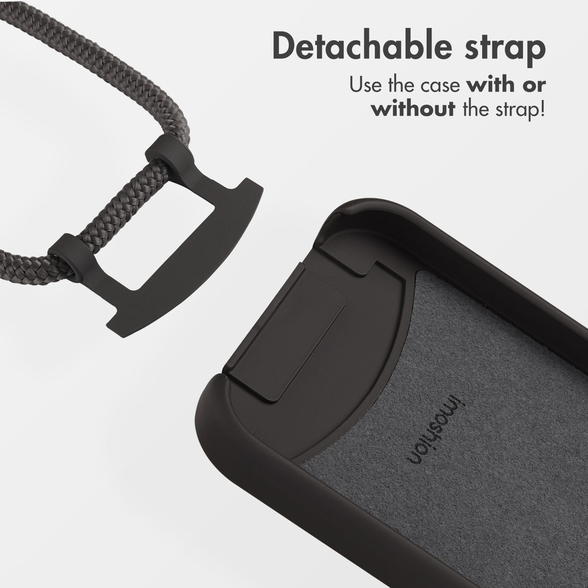 Ein schwarzes Smartphone-Case mit einem abnehmbaren grauen Trageriemen vor hellem Hintergrund.