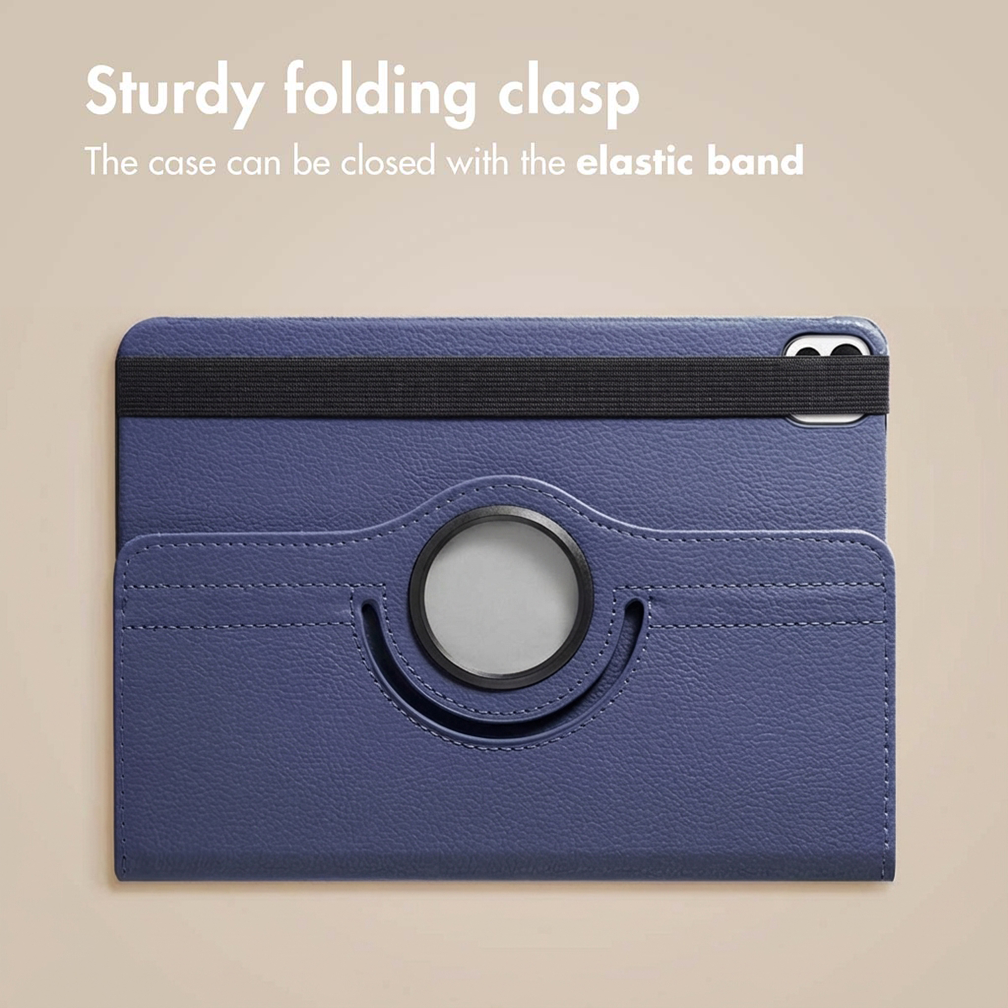 A blue tablet case with a black elastic band and a circular stand on the back against a plain background.