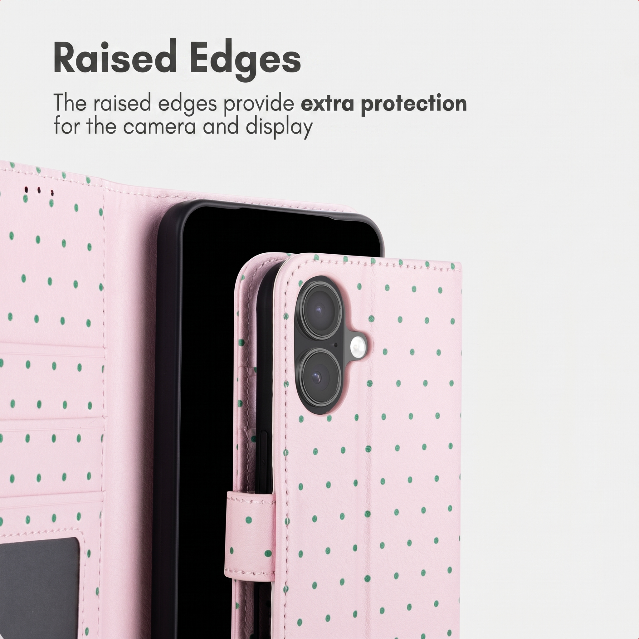 Rosa Wallet-Handyhülle mit grünen Punkten zeigt erhöhte Kanten für Kamera- und Display-Schutz.