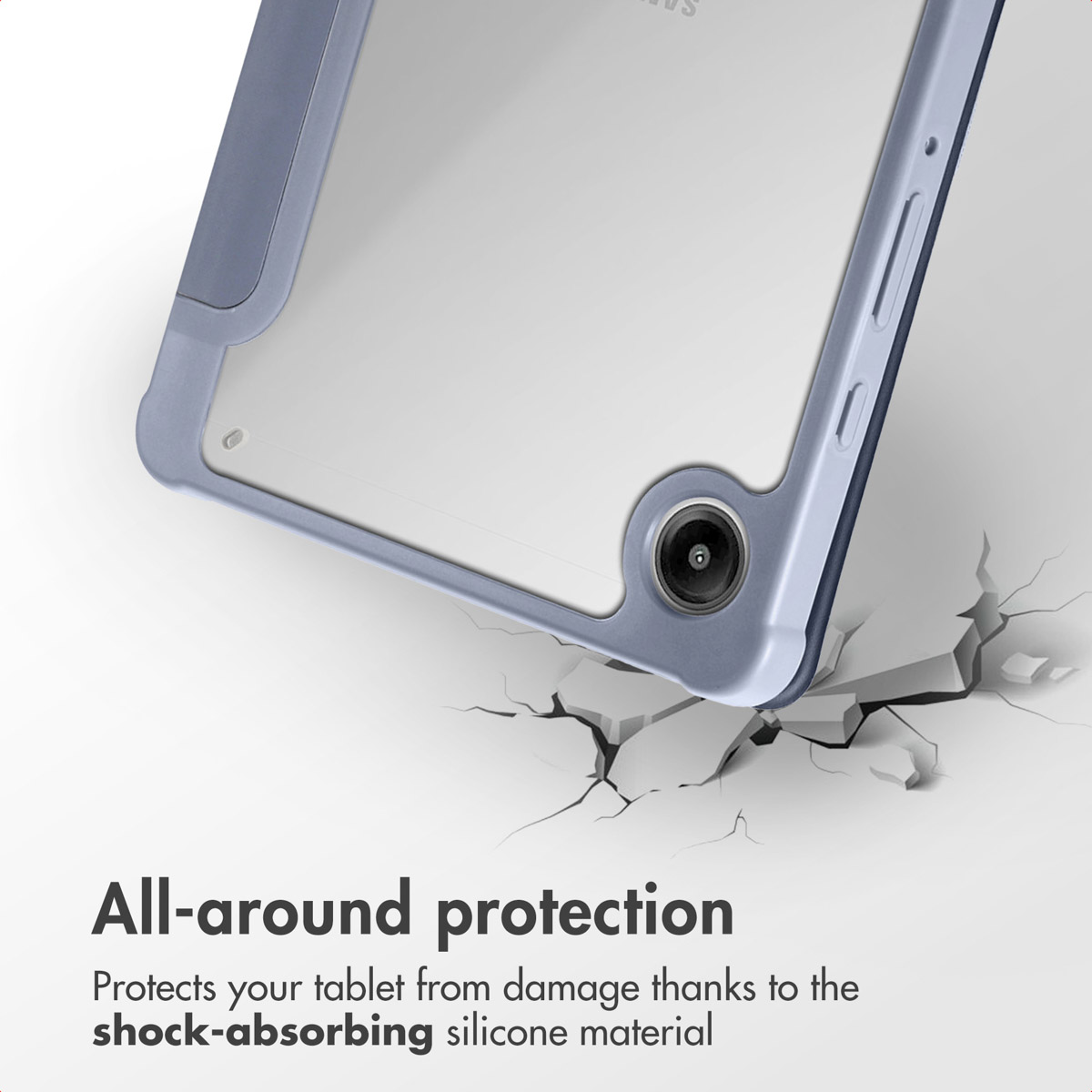 Tablette dans une coque de protection en silicone au-dessus d'une surface fissurée.