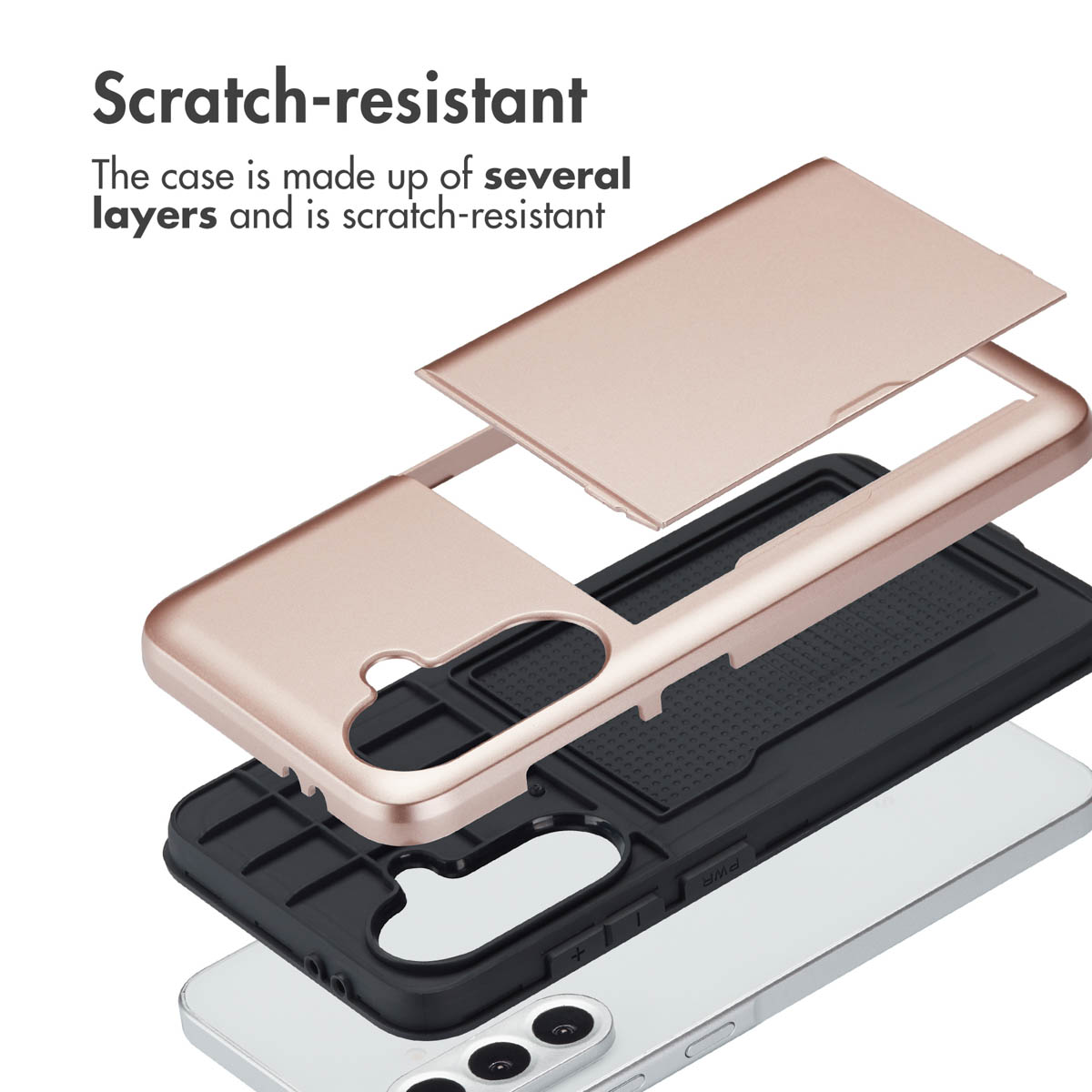 Coque de téléphone multicouche rose et noir démontée au-dessus d'un téléphone blanc.